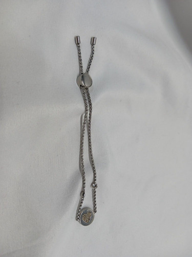 Bracciale donna Michael Kors cuore regolabile tono argento