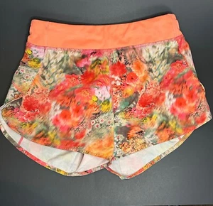Athleta Girl Size Large 12 Run the World Short Coral Pink Blurred Floral 3” - Picture 1 of 7