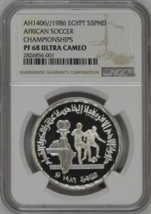 EGYPT , 5 POUNDS AFRICAN FOOTBALL CHAMPIONSHIP- CAIRO 1986 NGC PF 68 UC , RAREK - Picture 1 of 2
