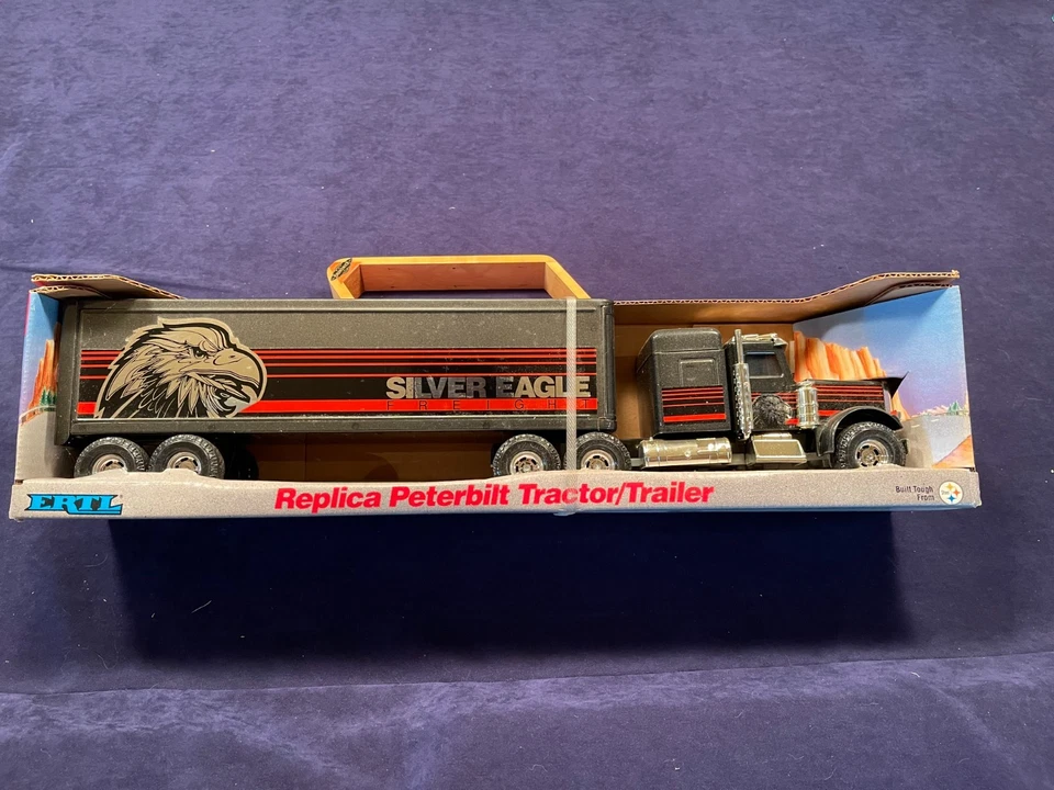 Remolque tractor Ertl 1989, acero prensado, Peterbilt, Silver Eagle, 21" de largo Foto 1 de 1