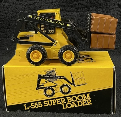 Sperry New Holland L-555 Super Boom Loader / Skid Steer 1/25 Scale NZG No. 276  - Image 1 of 4