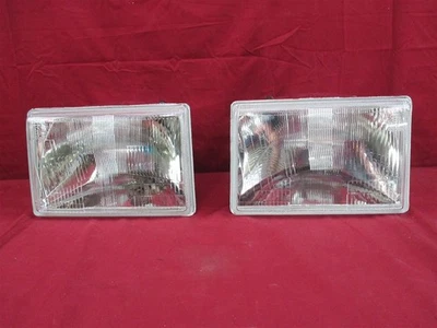 NOS OEM Jeep Grand Cherokee Headlamp Light 1994 - 98 EXPORT, PAIR - Image 1 of 4