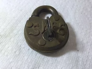 EARLY SMALL BRASS PADLOCK SAFE EMBEDED ON FACE COOD WORKING ORDER W KEY. - Picture 1 of 4