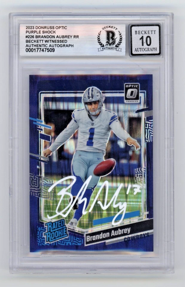 Amortiguador óptico púrpura Brandon Aubrey 2023 Donruss 226 radiocontrol firmado Beckett BGS 10 automático Foto 1 de 1