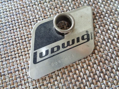 1980s VINTAGE LUDWIG ROCKER  BLACK & WHITE COLOR  BADGE & GROMMET . MADE IN USA - Image 1 of 4