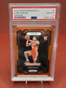 2023-24 Panini Prizm Monopoly - Kobe Bufkin #6 Orange Prizm /124 Bookend! PSA 8 - Picture 1 of 3