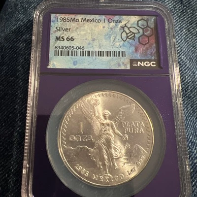 1985 Mo Mexico 1 Silver Onza, NGC Graded: MS 66 Libertad!  - Image 1 of 4