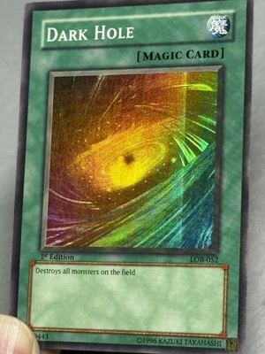 2002 Yugioh Dark Hole (Magic) LOB-052  1st Edition Foil Line Error Misprint - Image 1 of 4