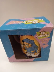 Taza de café Garfield con caja, "Me gustaría que las mañanas fueran mejores si miraran más tarde"... - Imagen 1 de 11