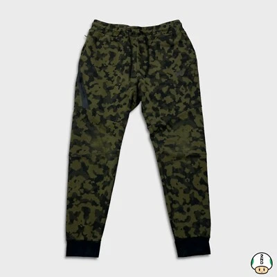 Pantalones deportivos Nike Sportswear para hombre medianos verde tecnología polar camuflaje atlético jogger Foto 1 de 4