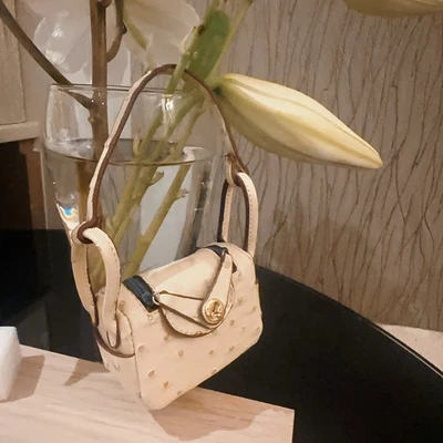 Мини кремовый цвет Lindy AirPod сумка/сумка подвеска - Изображение 1 из 4