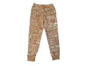 North Face NEW Boys Fleece Joggers Almond Butter Size Medium/10 Spellout - Picture 1 of 7