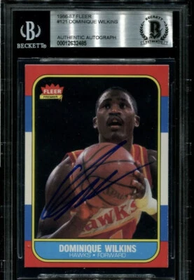 DOMINIQUE WILKINS SIGNED 1986 FLEER ROOKIE CARD #121 RC AUTO🔥BECKETT AUTHENTIC - Image 1 of 2