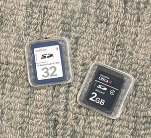 SanDisk Ultra II SD Card 2GB Class 4 & Cannon SD Memory Card 32MB NEW - Photo 1 sur 2