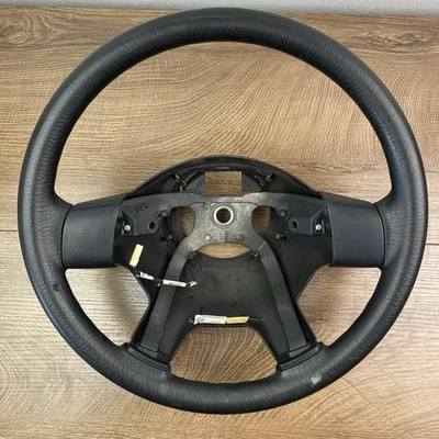 Volante de vinilo negro OEM 5GG25DX9AJ Jeep Liberty 03-07 OEM Foto 1 de 4