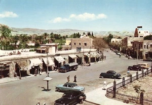 Postcard Palestine Israel West Bank Jericho c1955 street scene cars shops - Picture 1 of 2