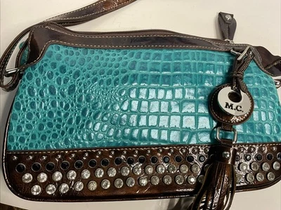Cartera Madi Clare imitación cocodrilo verde azulado/marrón con detalles y tachuelas. Nuevo. Sin etiquetas. 🐊 Foto 1 de 4