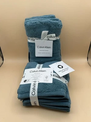 Juego de toallas de mano azules Calvin Klein de 2 piezas con juego de lavado de 4 piezas toallas Solucell Foto 1 de 4
