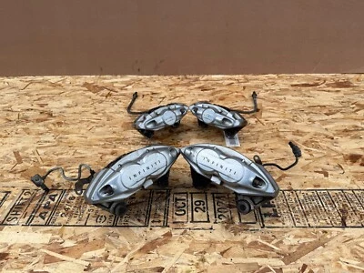 INFINITI NISSAN 2007-2024 OEM FRONT REAR LEFT RIGHT AKEBONO BRAKES CALIPERS ASSY - Image 1 of 4