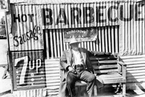 Black Man Sits On Bench At Barbecue Hut 8x12 Reprint Of Old Photo - Picture 1 of 1
