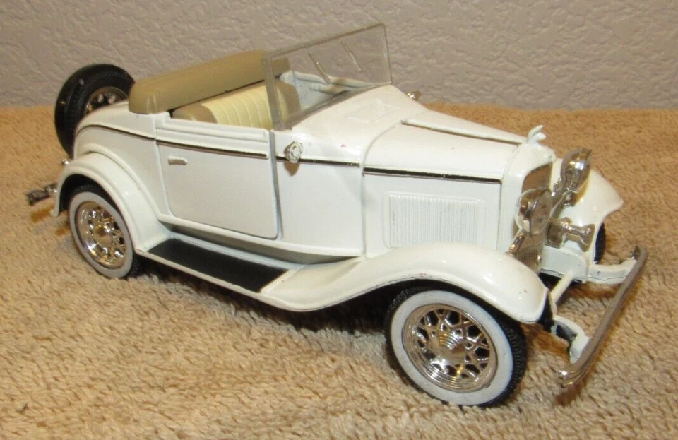 1932 Ford Model 18 V-8 Cabriolet Diecast Car 5-1/4 inches long White - Image 1 of 2