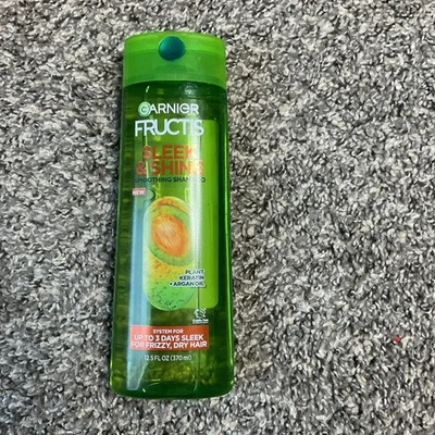 Garnier Fructis Elegante y Brillante Frizz Derrota Tratamiento Profundo 12.5 FL oz Aceite de Argón Foto 1 de 3