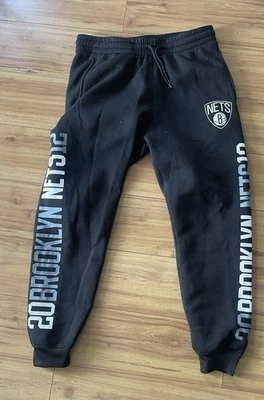Pantalones deportivos Brooklyn Nets NBA grandes negros para hombre 20 logotipo Brooklyn Nets 12 Foto 1 de 4