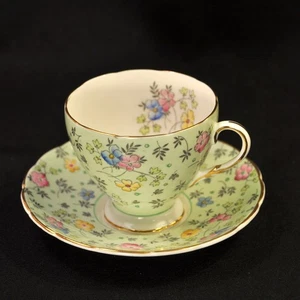 Taza y platillo E. Brain Foley pintados a mano flores verdes y dorados 1948-1963 Inglaterra - Imagen 1 de 24