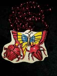 2002 Krewe von Bacchus Insekten Käfer Schmetterling Schwimmperle Karneval Afrika - Bild 1 von 2