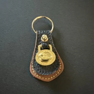 FUNDA LLAVE DOONEY BOURKE VINTAGE PARA TODO CLIMA CUERO NEGRO Y TOSTADO USADA EN EXCELENTE ESTADO - Imagen 1 de 2