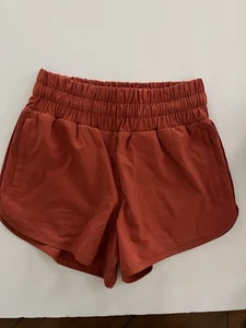 Thrive Societe Running Sport Shorts Gr. XS Burnt Orange Reißverschlusstaschen - Bild 1 von 8
