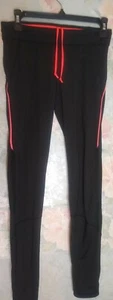 Pantalones negros deportivos y de entrenamiento atlético H&M. Cremalleras de acento naranja fluorescente - S - Imagen 1 de 6