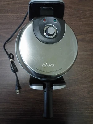 Gofrera belga Oster CKSTWFBF22-ECO DuraCeramic abatible probada Foto 1 de 4