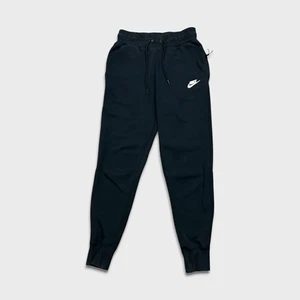Pantalones deportivos Nike para hombre XS negros tecnológicos polar Swoosh pierna cónica jogger - Imagen 1 de 9