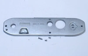 Tornillos de placa de puerta con cubierta inferior Nikon FG de colección SLR 35 mm piezas de cámara fotográfica - Imagen 1 de 1