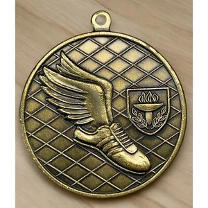 Vintage Track Medal Boys Long Jump 1st Place Trophy Pendant MVC 1988 Winged Shoe - Picture 1 of 6