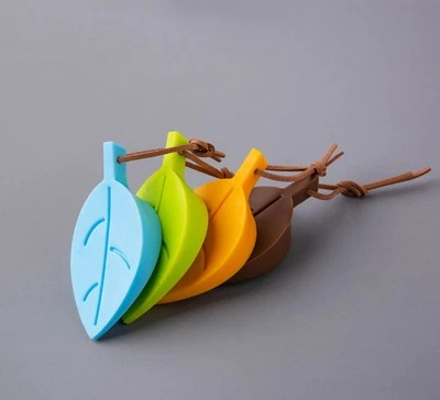 Tapón de puerta eficaz con forma de hoja solución de seguridad manual a prueba de niños Foto 1 de 4