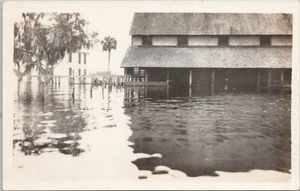 RPPC LaBelle Florida Flooded Street Scene at Large Barn Building c. 1910 - Picture 1 of 2