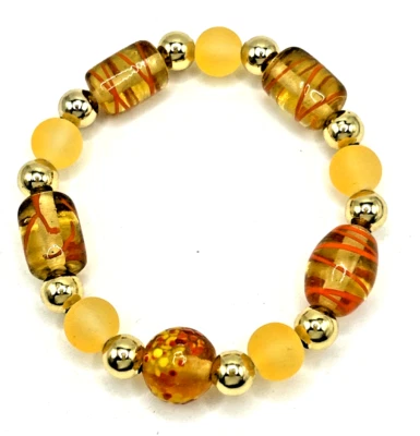 Brazalete elástico con cuentas de murano de vidrio artístico grueso de 7,25" de acero inoxidable dorado Foto 1 de 4