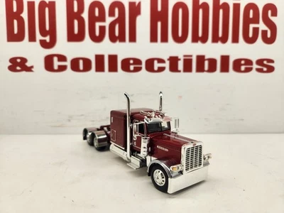 1/64 DCP  Burgundy Peterbilt 389 Pride and Class 63" Flattop Sleeper Tractor - Image 1 of 4