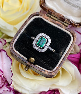 Art Deco Emerald and Diamond Platinum Ring 0.25ct + 0.60ct