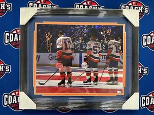 FRAMED Cal Clutterbuck, Matt Martin & Casey Cizikas TRIPLE Autographed 16x20 Pho - Picture 1 of 4