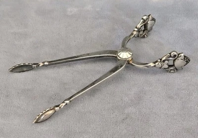 Pinzas para servir azúcar de plata esterlina GEORG JENSEN BELLOTA Dinamarca Foto 1 de 4