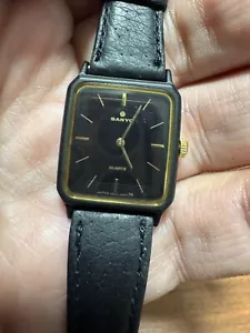 Vintage Sanyo Quartz Watch - Elegant Retro Design - Black & Gold - Japan Made - Picture 1 of 10