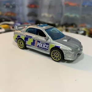 Matchbox Subaru Impreza WRX 2007 Police 1/64 - Picture 1 of 10