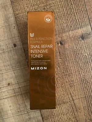 Tónico intensivo Mizon Multifunción Formula Snail Repair 3,38 oz spray Foto 1 de 4