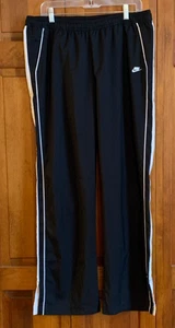 Nike Fit Dry Damen-Sporthose schwarz mit weißen Streifen Etikett Größe L (12-14) - Bild 1 von 4