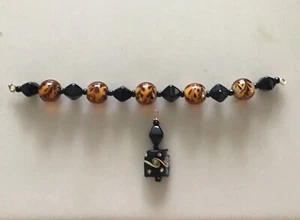 LAMPWORK AMBER COLOR and BLACK VINTAGE BICONE BEADS AND PENDANT - Picture 1 of 3