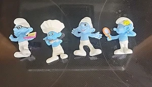 Schlumpf Figur Schlümpfe Figuren Mcdonald 4er Set 2011 McDonald’s Tortenaufleger - Bild 1 von 9