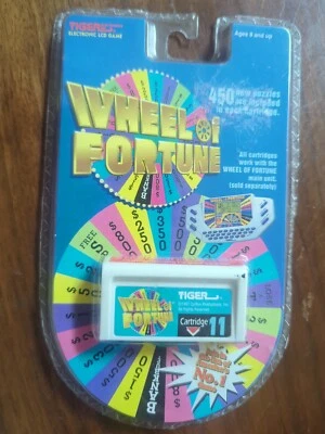 Tiger Electronics Wheel of Fortune Handheld Electronic Game - 7-533-11  1996 NEW - Image 1 of 2